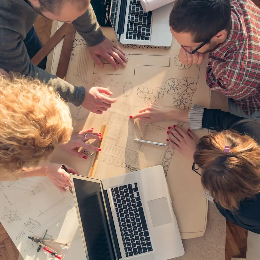 Business specialists collaborating around project data